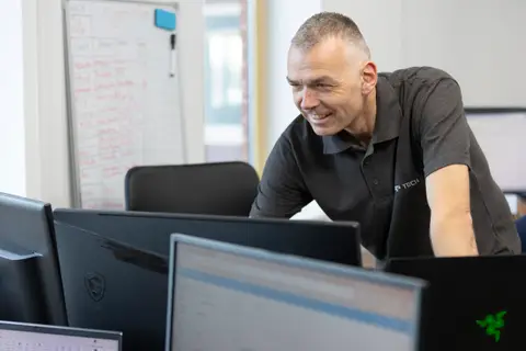 CAP engineer working at their desk